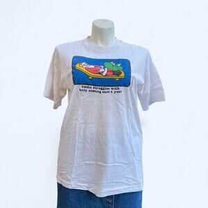 Vintage 90s Grimm “Santa struggles with only coming once ” Christmas T Shirt